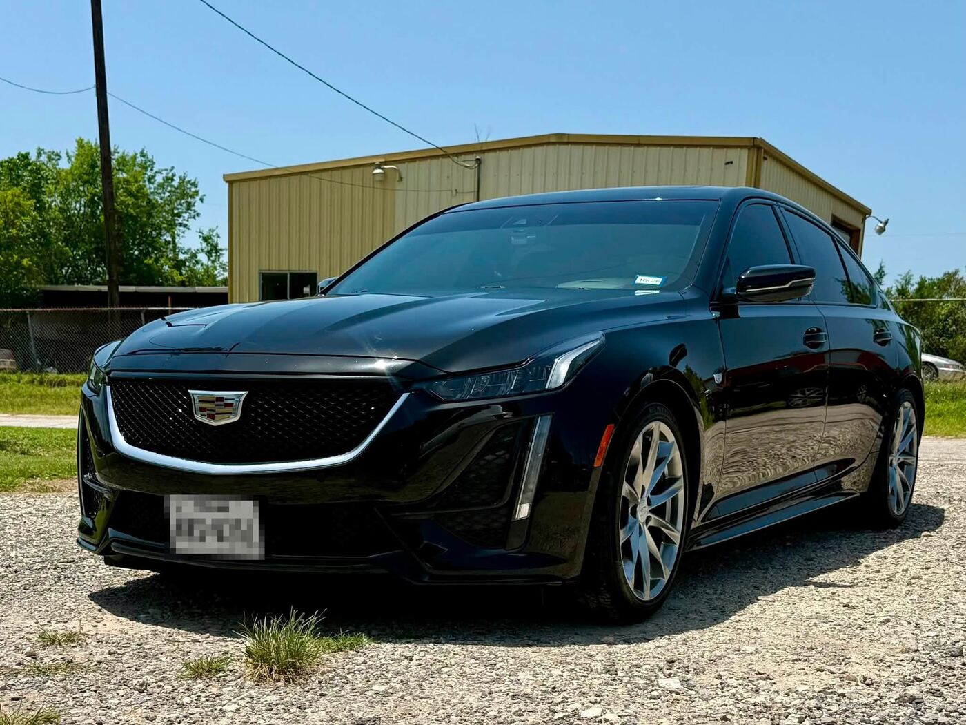 Black Cadillac CT5 sedan after a detail
