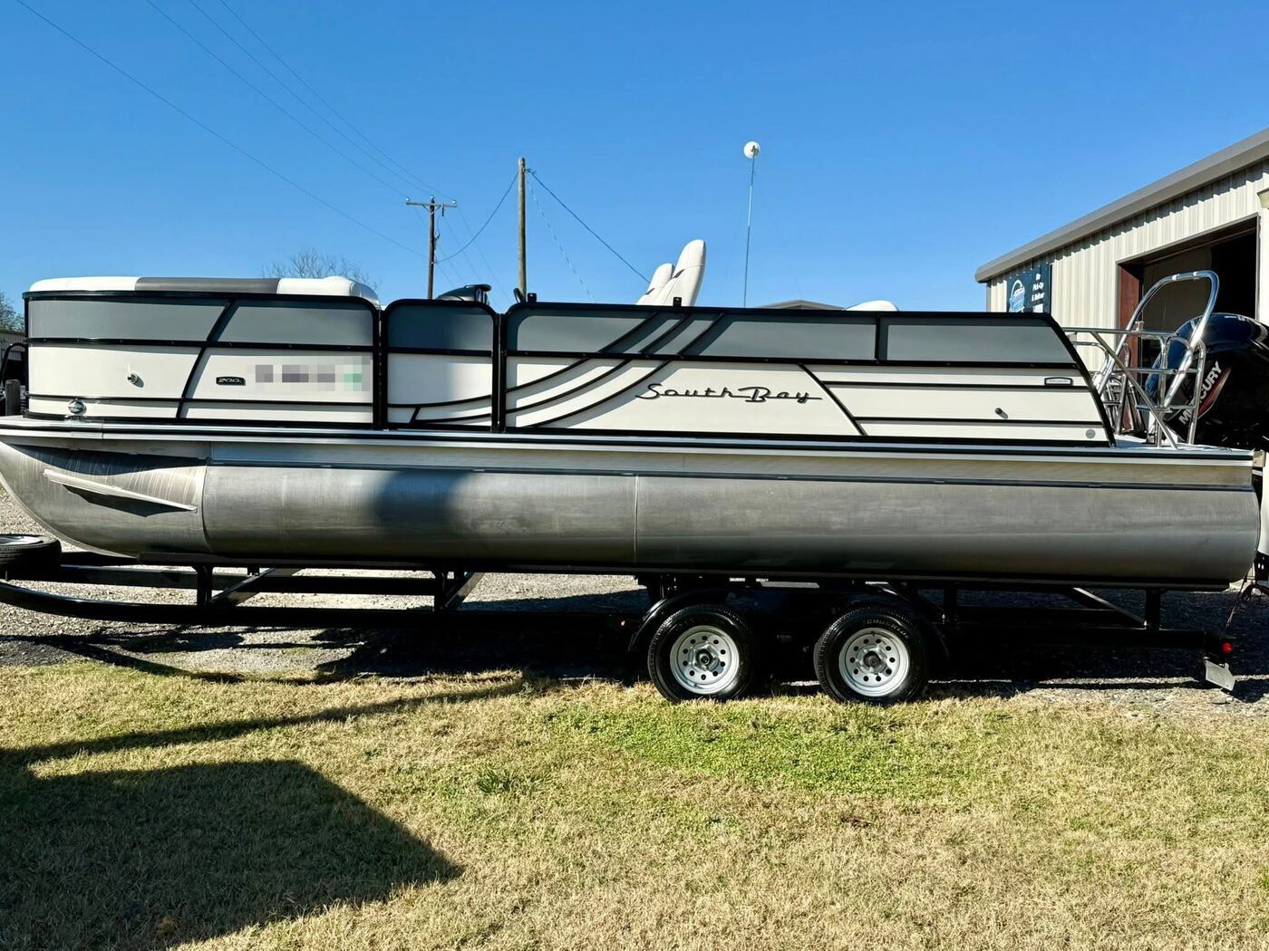South Bay pontoon boat on a trailer